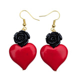 Corazón Sagrado in black and red